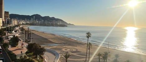 On the beach, sun-loungers, beach towels