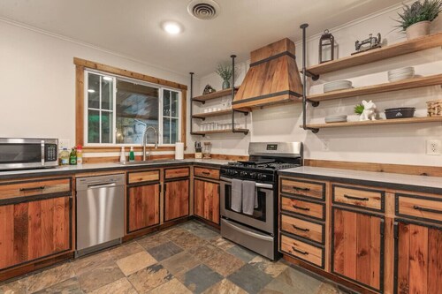 Rustic Charm Owasso Retreat | 2BR • Big Backyard