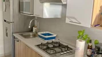 Fridge, microwave, coffee/tea maker, toaster