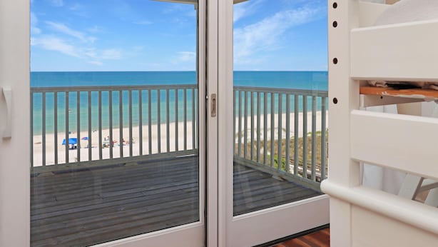 A balcony with a view of the beach and ocean. - Moonstruck (Port St. Joe)