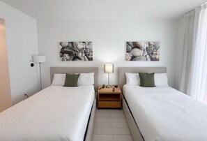 2 bedrooms, desk, iron/ironing board, travel crib