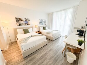 2 bedrooms, desk, iron/ironing board, travel cot