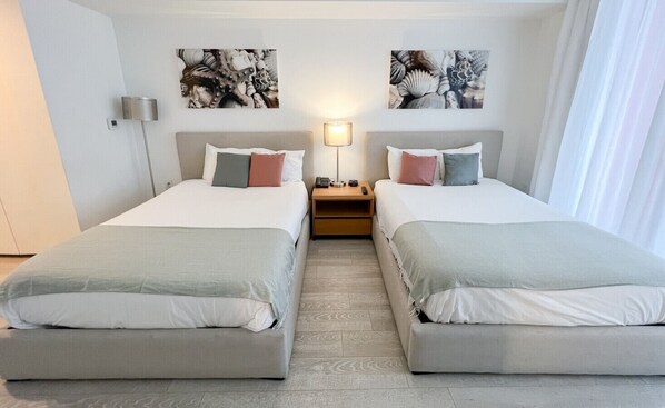 2 bedrooms, desk, iron/ironing board, travel cot