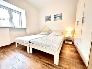 1 quarto, acesso à internet, roupa de cama