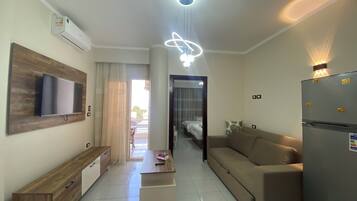 Family Apartment, Sea View | Living area