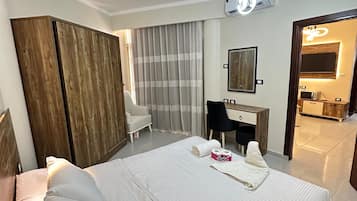 Superior Apartment, Partial Sea View | Desk, laptop workspace, free WiFi