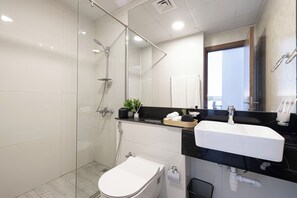 Hair dryer, bidet, towels, soap