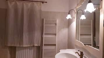 Shower, bidet, towels, soap