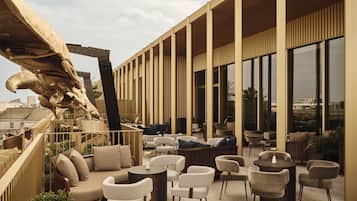 Rooftop bar, garden views, open daily