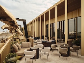 Rooftop bar, garden views, open daily