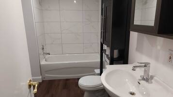 Jetted bath, hair dryer, bidet, towels