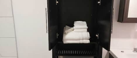 Jetted bath, hair dryer, bidet, towels