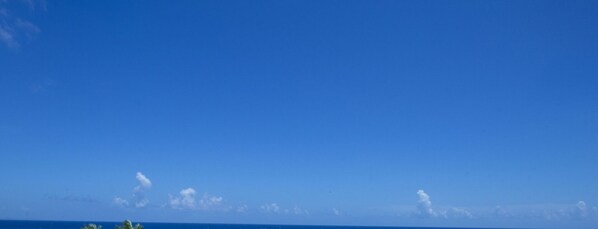 A clear blue sky with a few scattered clouds over a flat landscape. - New Villa With the Private Pool - is Ideal for Your Family (Sosúa)