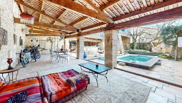 An outdoor patio with a pool, a dining area, and a seating area with a sofa and tables. - Nice home in Saint-Simon with private swimming pool, can be inside or outside (Saint-Simon)