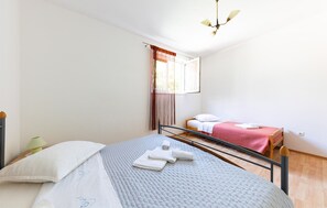 1 bedroom, travel crib, free WiFi, bed sheets