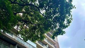 A multi-story building with balconies, large windows, and a flat facade. - Studio apartment in Bela Vista, 400m from Paulista Avenue. (Bela Vista São Paulo)