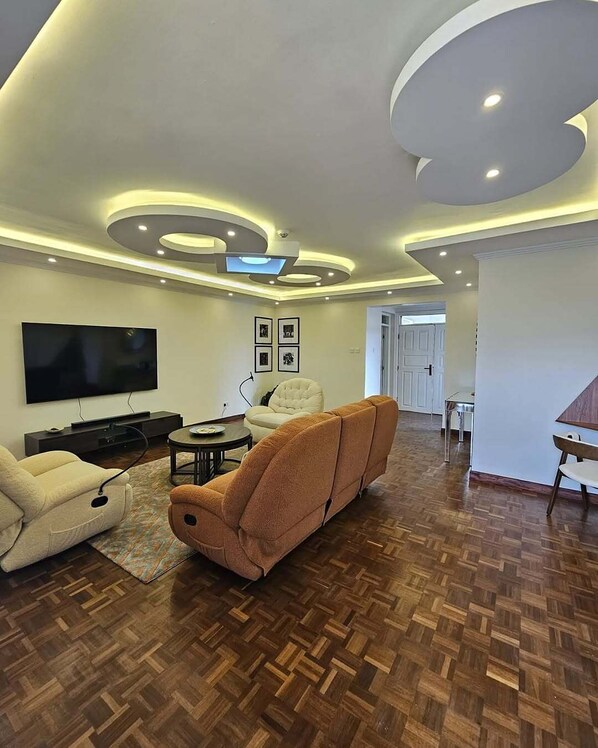 Apartment, City View | Living area | Computer monitors - Flexa Cozy Apartments (Nairobi)