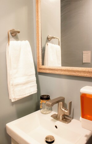 Hair dryer, towels, soap, toilet paper