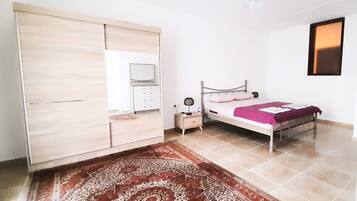 Dúplex Grand, cocina, vista al jardín | 3 habitaciones y caja de seguridad en la habitación