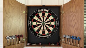 A dartboard with a wooden frame and a dartboard with a black background and red and green rings. - Poolside Family Haven Near Beach w/ Game Room (Savannah)