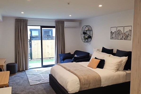 1 bedroom, desk, iron/ironing board, travel crib