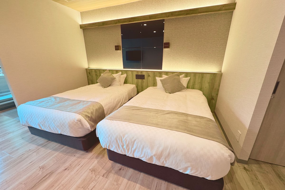 Standaard Twin kamer | 1 slaapkamer, een kluis op de kamer, gratis wifi, beddengoed