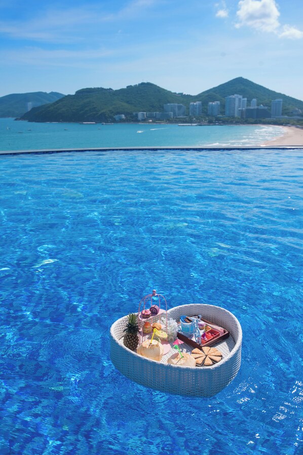 Outdoor pool, open 8:00 AM to 10:30 PM, pool umbrellas, pool loungers