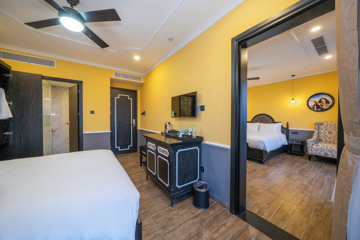 Deluxe Quadruple Room, Balcony, Beach View | Memory foam beds, in-room safe, blackout drapes, soundproofing