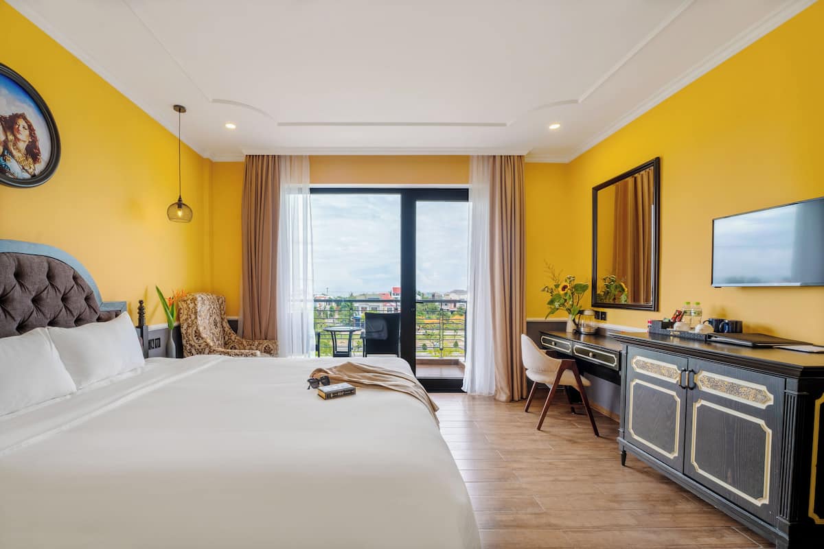 Deluxe Double Room, Balcony, Beachfront | Memory foam beds, in-room safe, blackout drapes, soundproofing