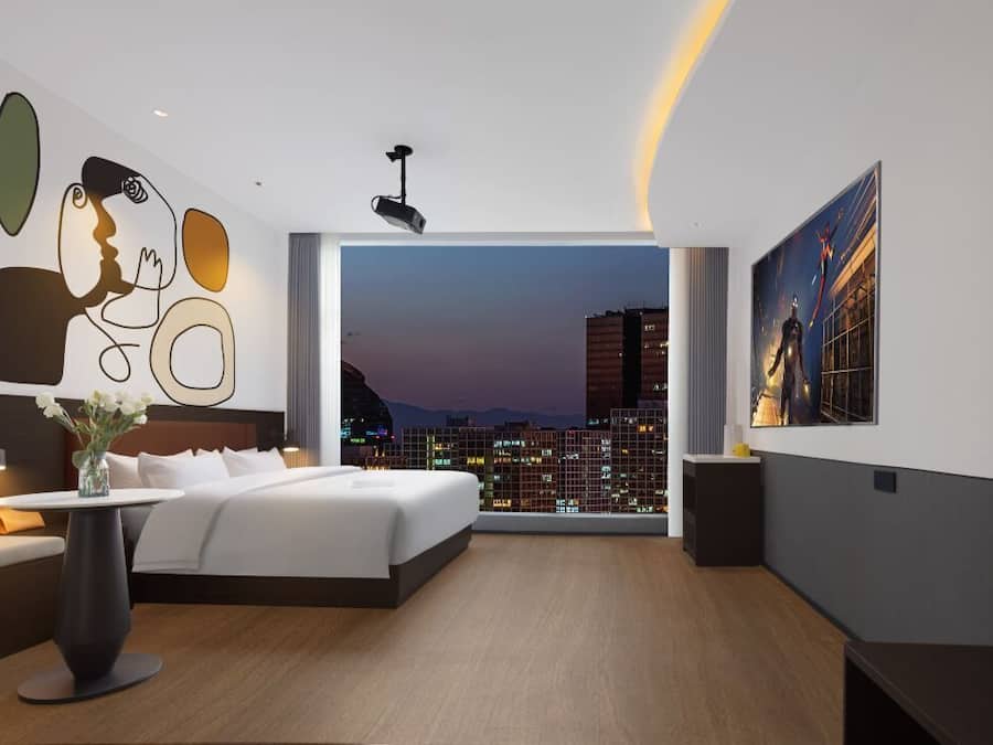 Down duvets, laptop workspace, blackout curtains, soundproofing