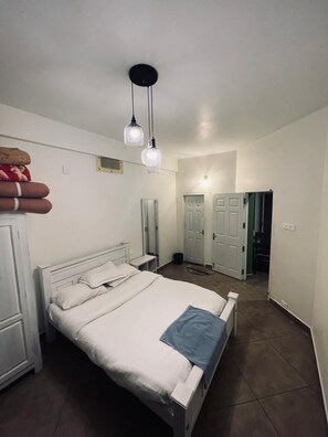 Economy Room, 4 Bedrooms | Premium bedding, in-room safe, free WiFi, bed sheets