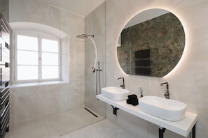 Shower, hair dryer, towels, soap