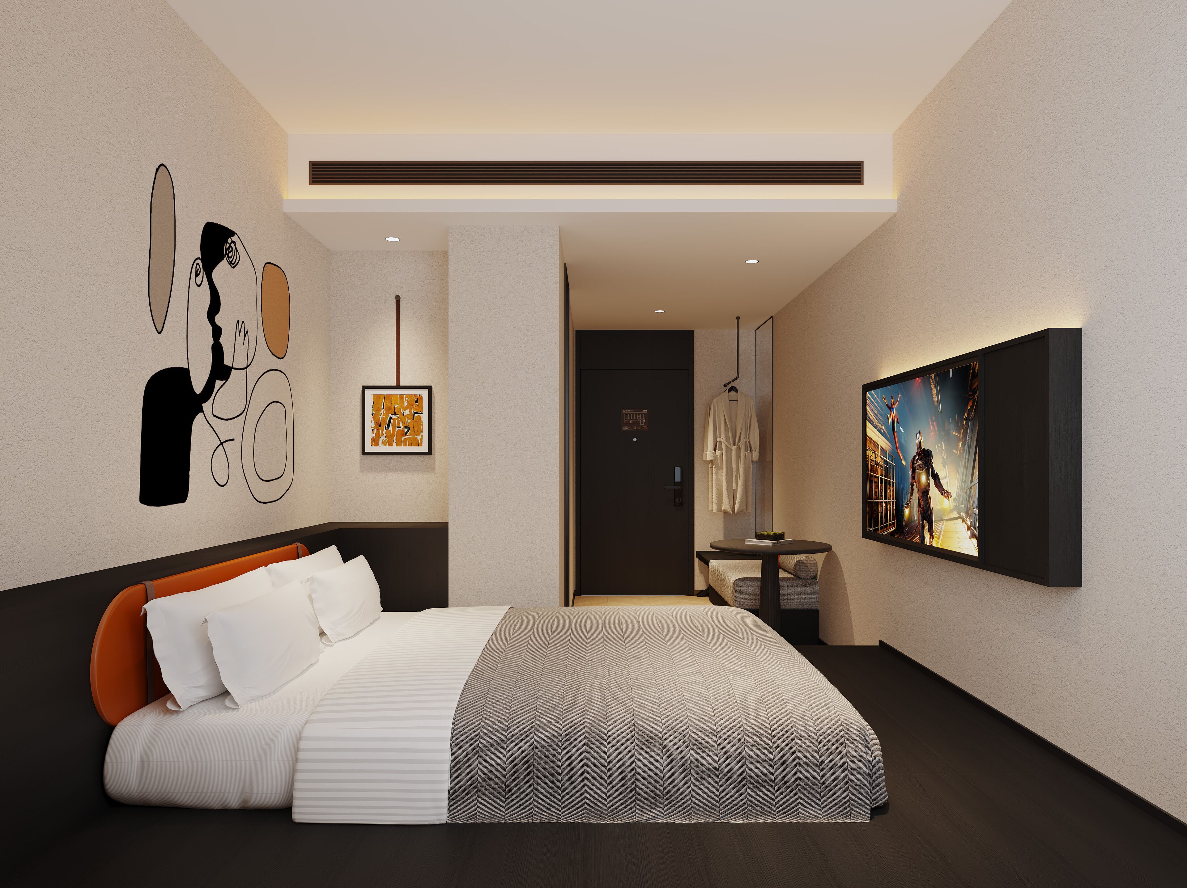 Ein modernes Hotelzimmer mit einem großen Bett, einem kleinen Tisch und einem an der Wand befestigten Fernseher.