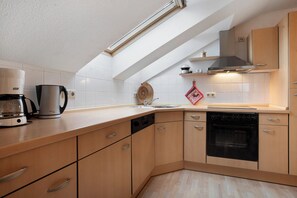 Réfrigérateur, four, plaque de cuisson, lave-vaisselle