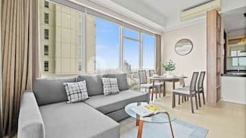 Apartment, 2 Bedrooms, City View | Living area | Flat-screen TV