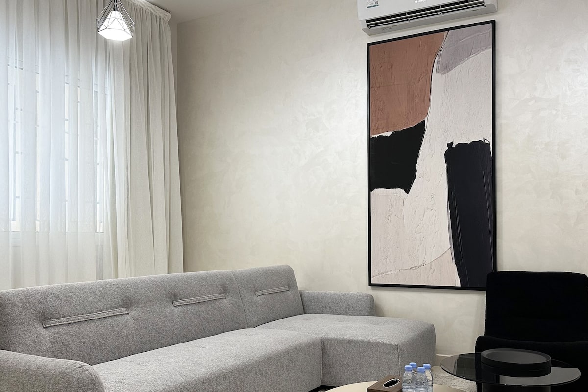 Superior Apartment, 3 Bedrooms | Living area | 55-inch Smart TV with cable channels