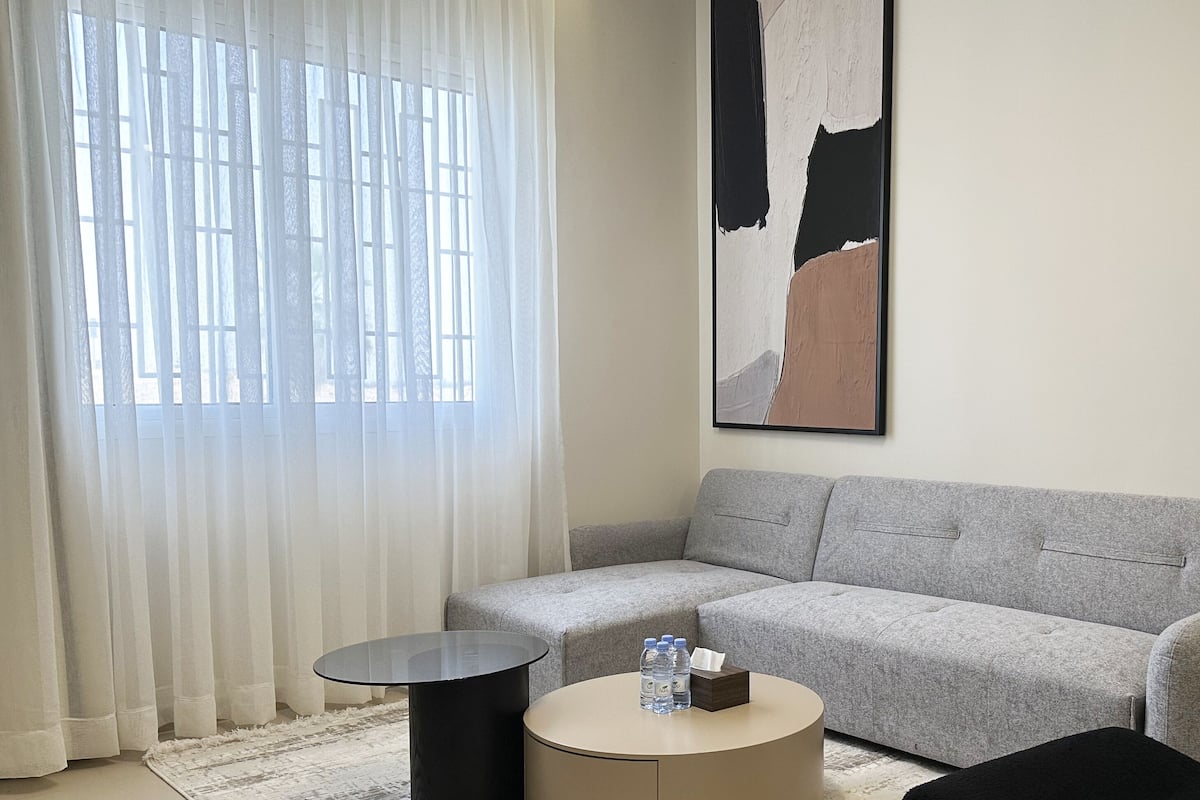 Superior Apartment, 3 Bedrooms | Living area | 55-inch Smart TV with cable channels
