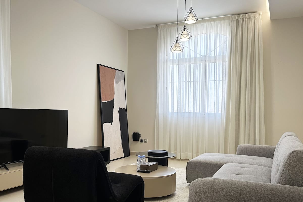 Superior Apartment, 3 Bedrooms, Tower | Living area | 55-inch Smart TV with cable channels
