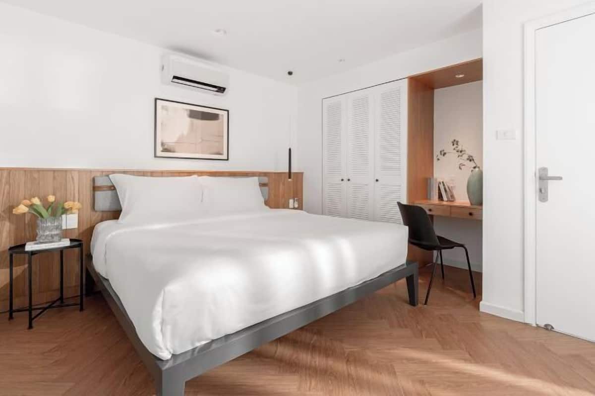 Desk, laptop workspace, blackout curtains, free WiFi