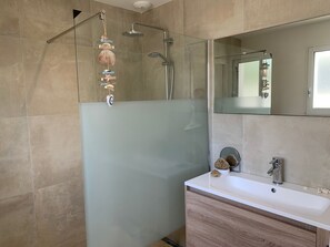 Shower, hair dryer, towels, soap