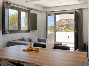 Stone two-bedroom suite | Living area | 42-inch Smart TV with digital channels - Emerald Tinos (Tinos)