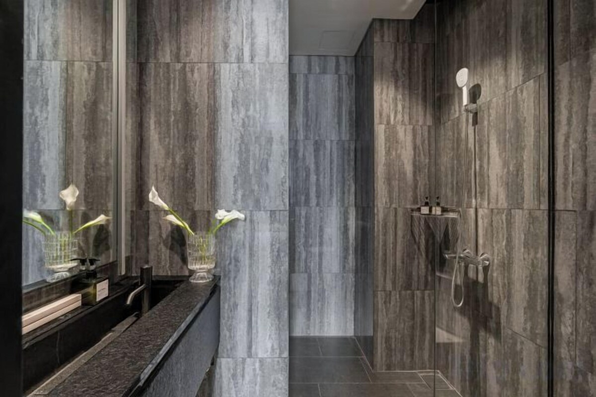 Bathroom | Free toiletries, hair dryer, slippers