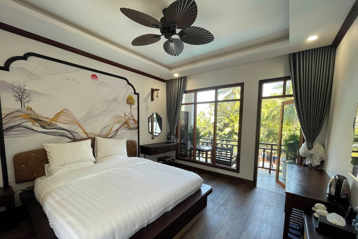 Superior Double Room, Pool View | Desk, laptop workspace
