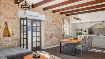 House (Villa Casa Di Pietra) | Living room | 32-inch flat-screen TV with satellite channels, ping pong