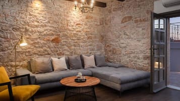 House (Villa Casa Di Pietra) | Living room | 32-inch flat-screen TV with satellite channels, ping pong