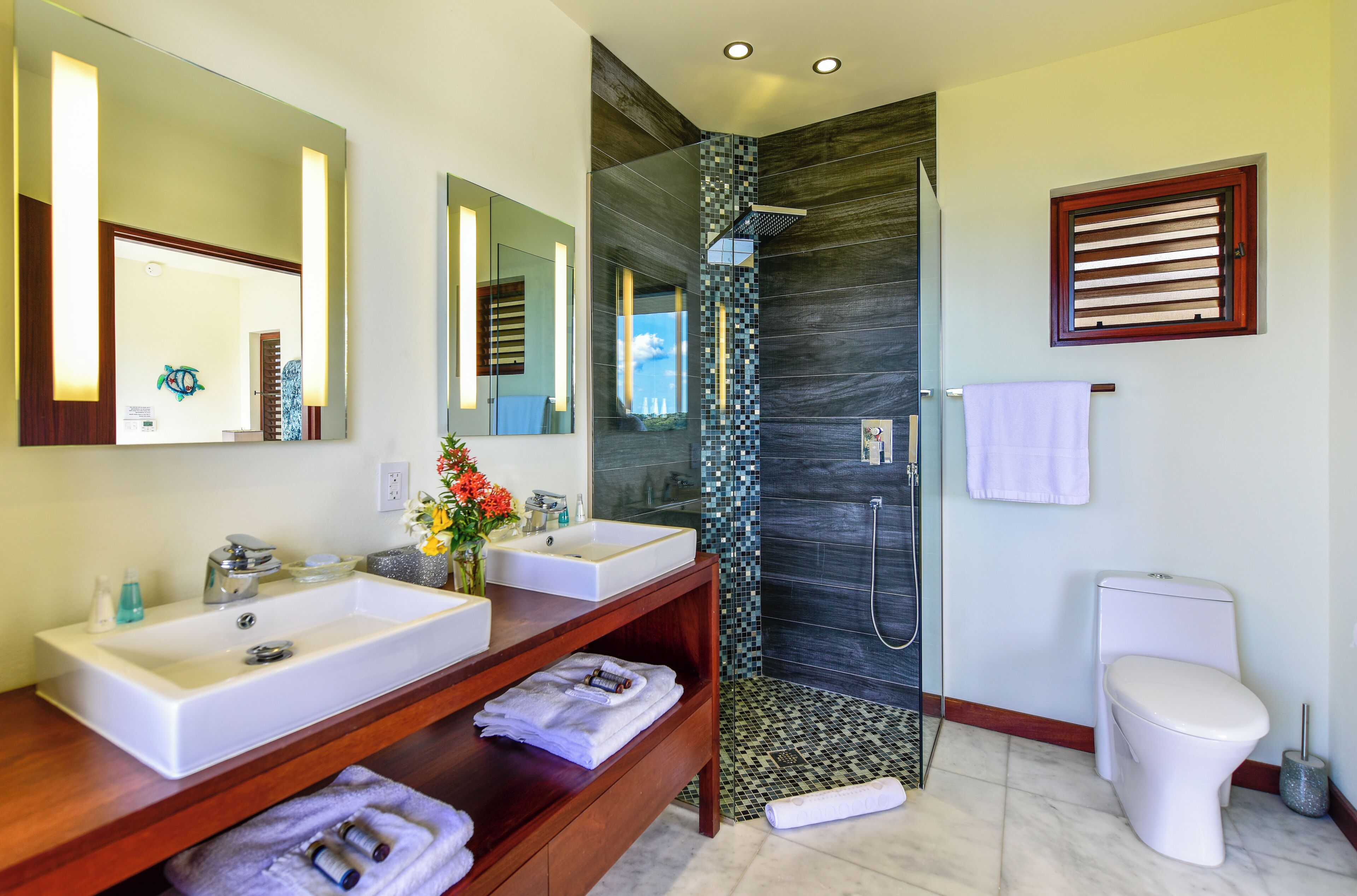 Shower, hair dryer, towels, soap