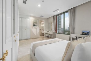 Apartment, 3 Bedrooms, City View | Iron/ironing board, free WiFi - Brassia by Kozystay - Thamrin (Jakarta)