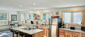 Brand new family home nestled in the woods close to Waterbury, Stowe, and Sugarbush with a hot tub