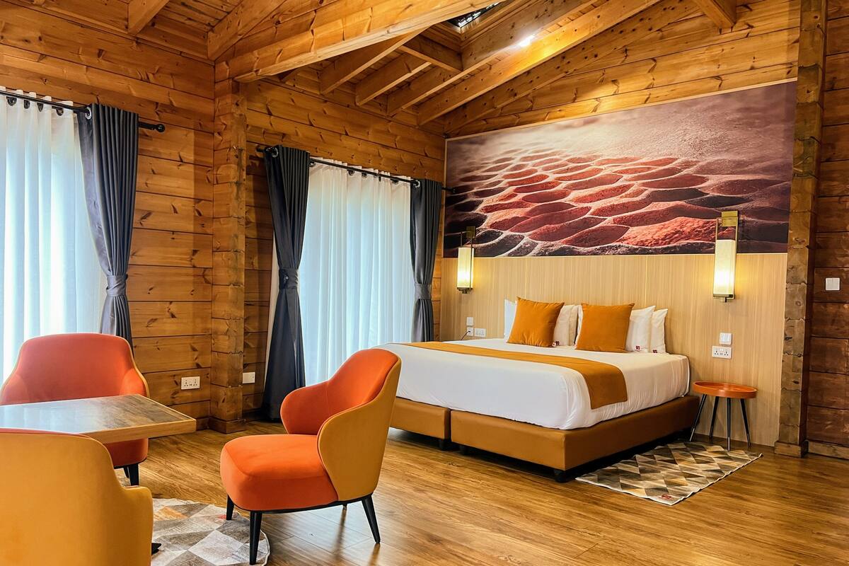 Cabana executiva | Frigobar, ferros/tábuas de passar roupa, Wi-Fi de cortesia