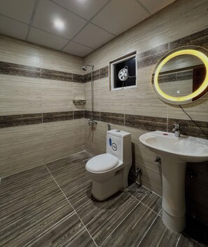 Bidet, towels, soap, toilet paper - 4BR Penthouse: Sky-High Luxury with Margalla views. (Islamabad)